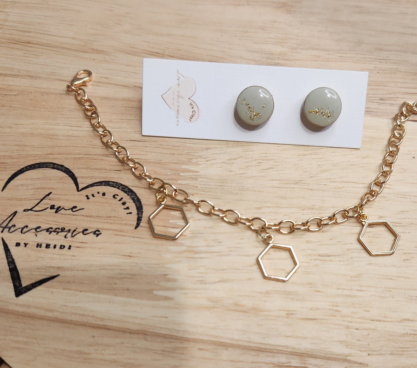 "Goldie" Jewelry set signature Hexi gold bracelet with round gold rim mint color studs.