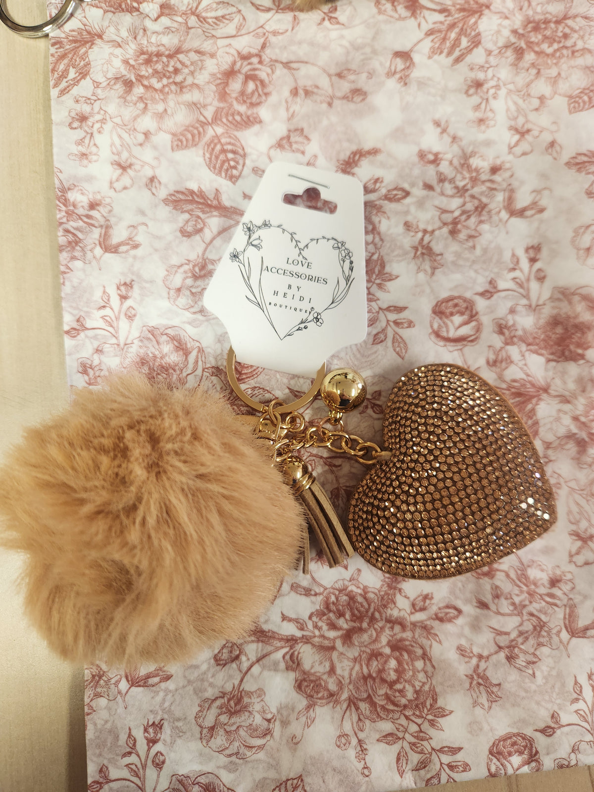 Round soft fur ball with glitzy heart keychain