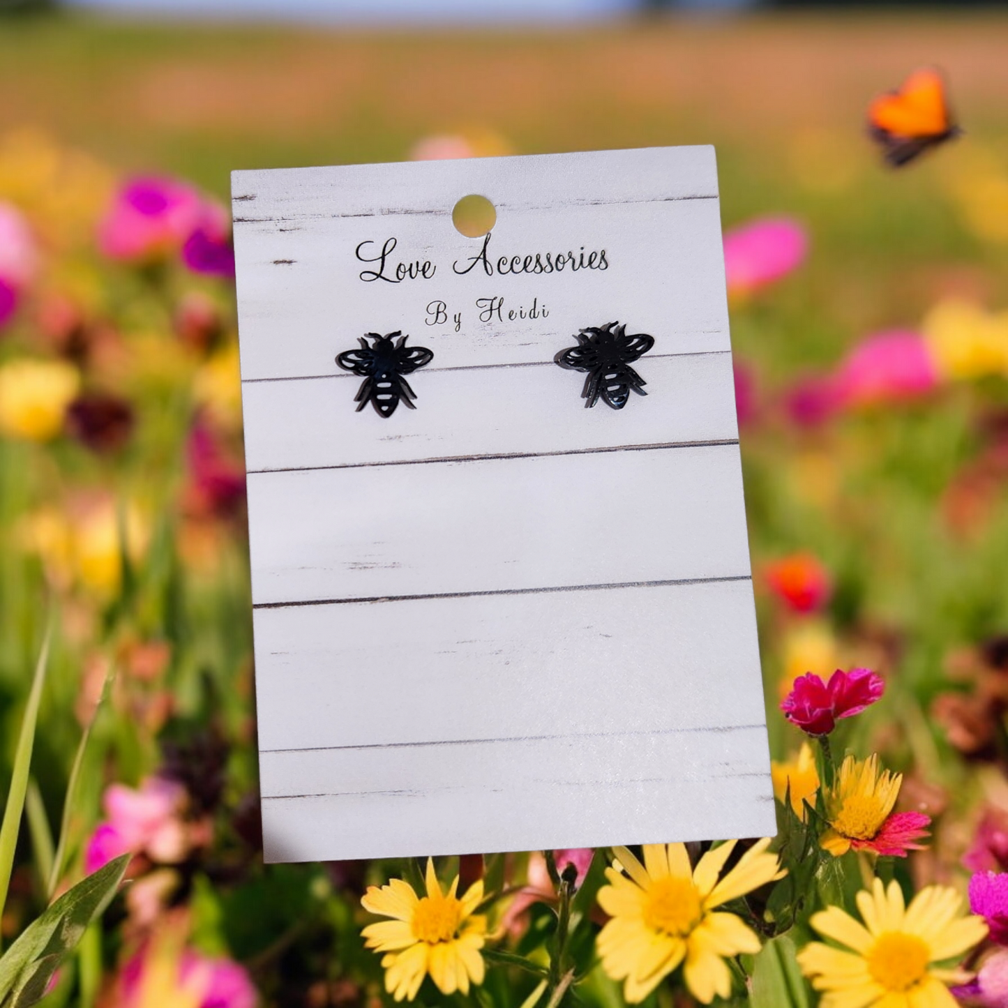 Medium size black stud bee earrings