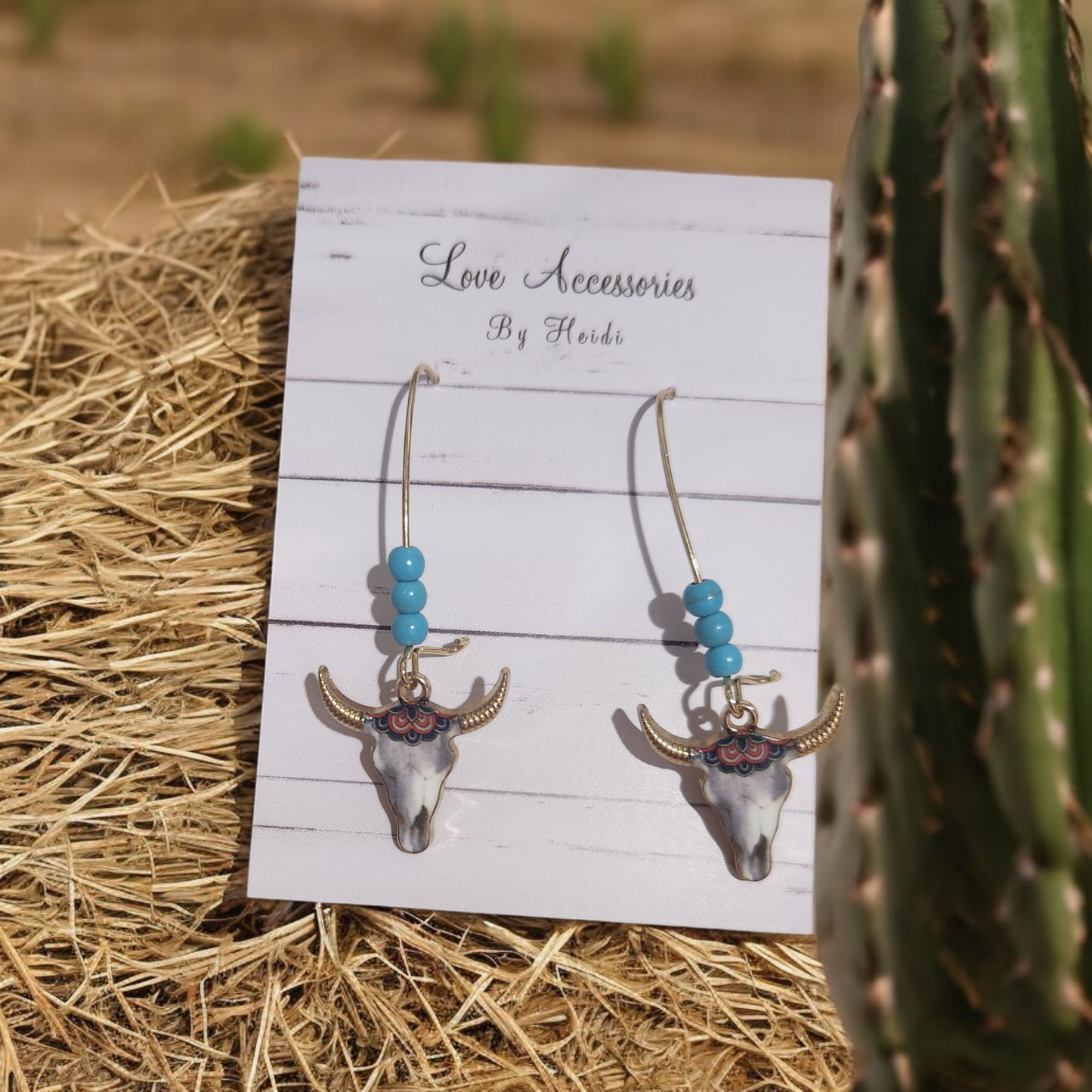 Long turquoise round stone Steer skull earrings