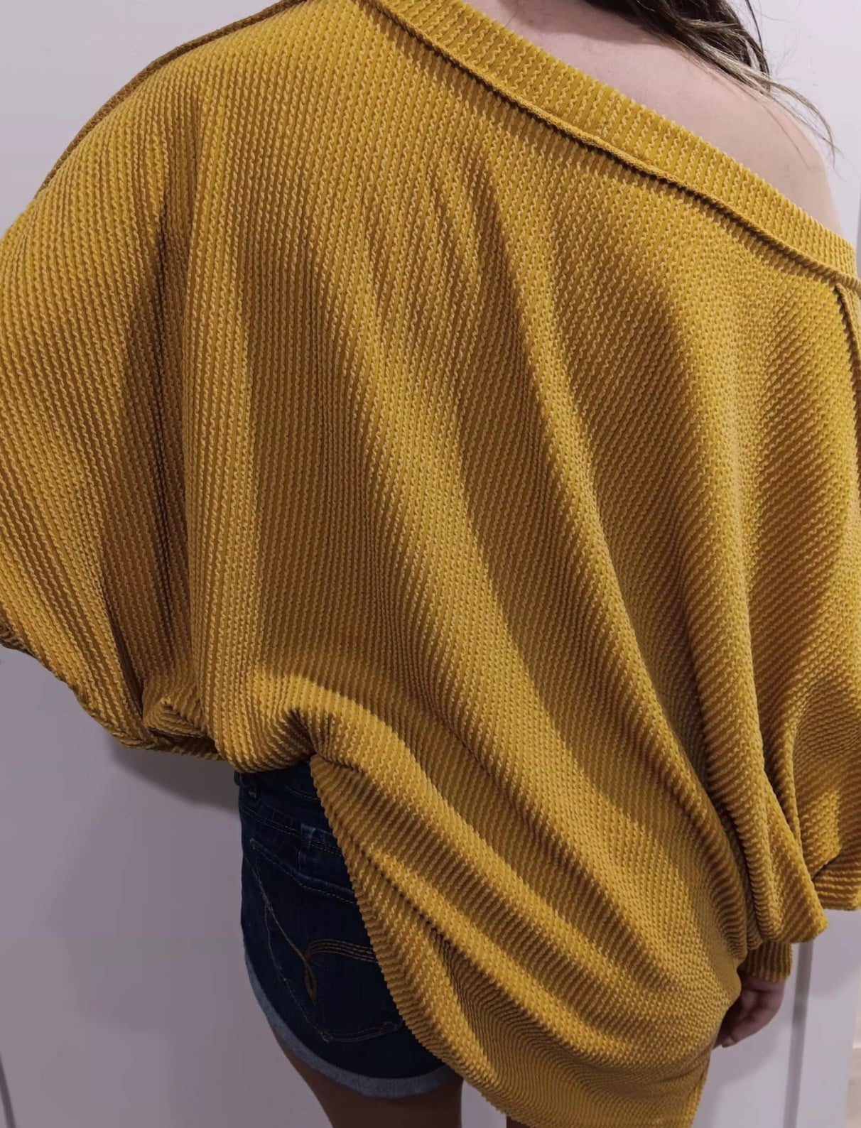 Wavy ribbed long sleeve loose fit top in Mustard color