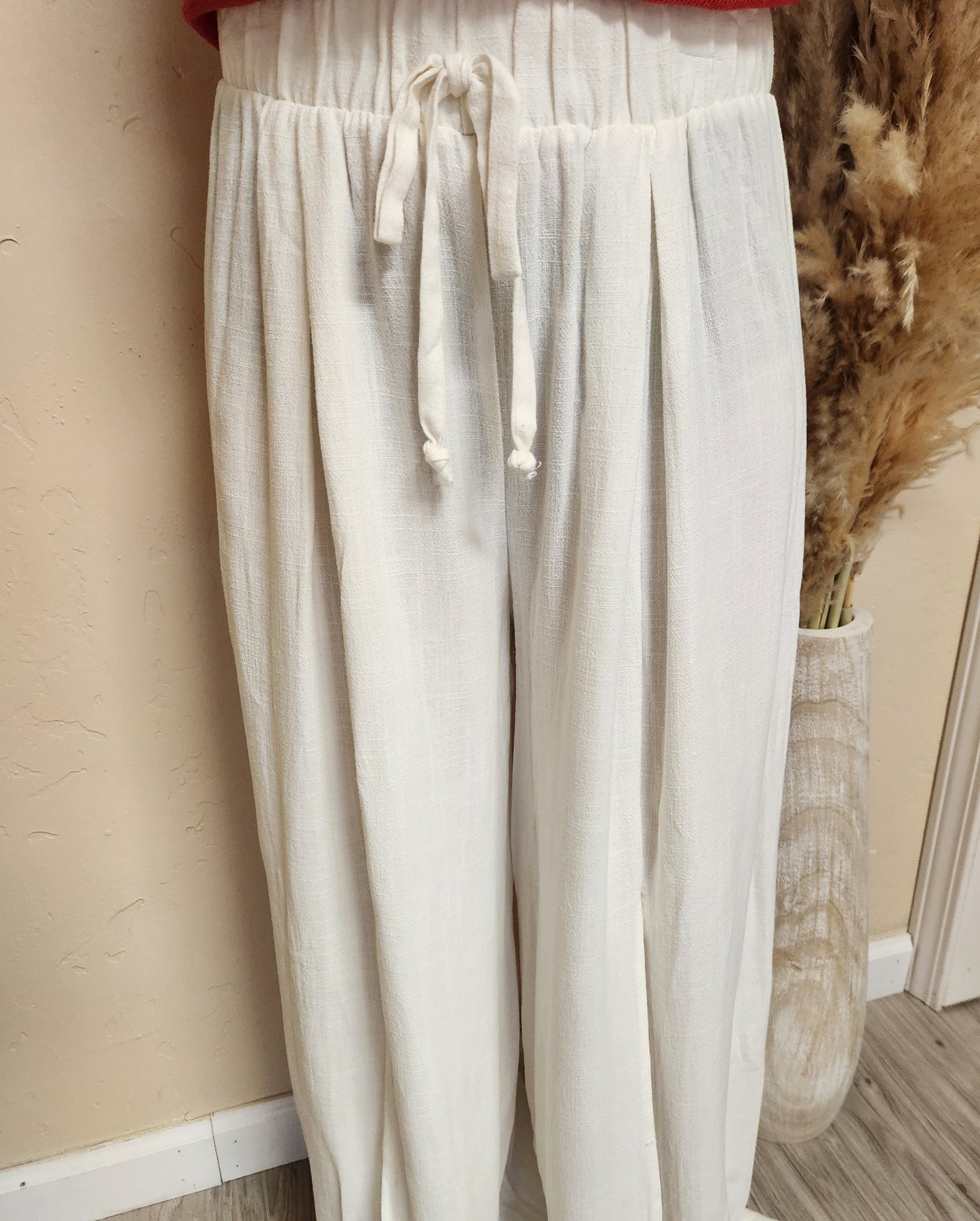 Lounge pants w/knee high front slit in off white Semi-Sheer