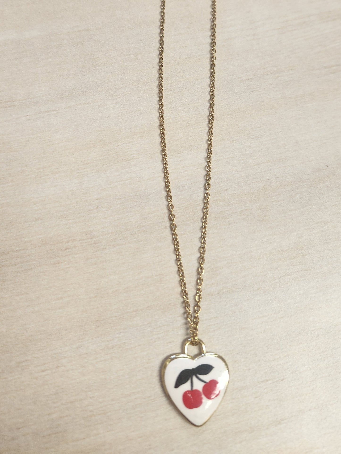 Delicate gold charm necklaces