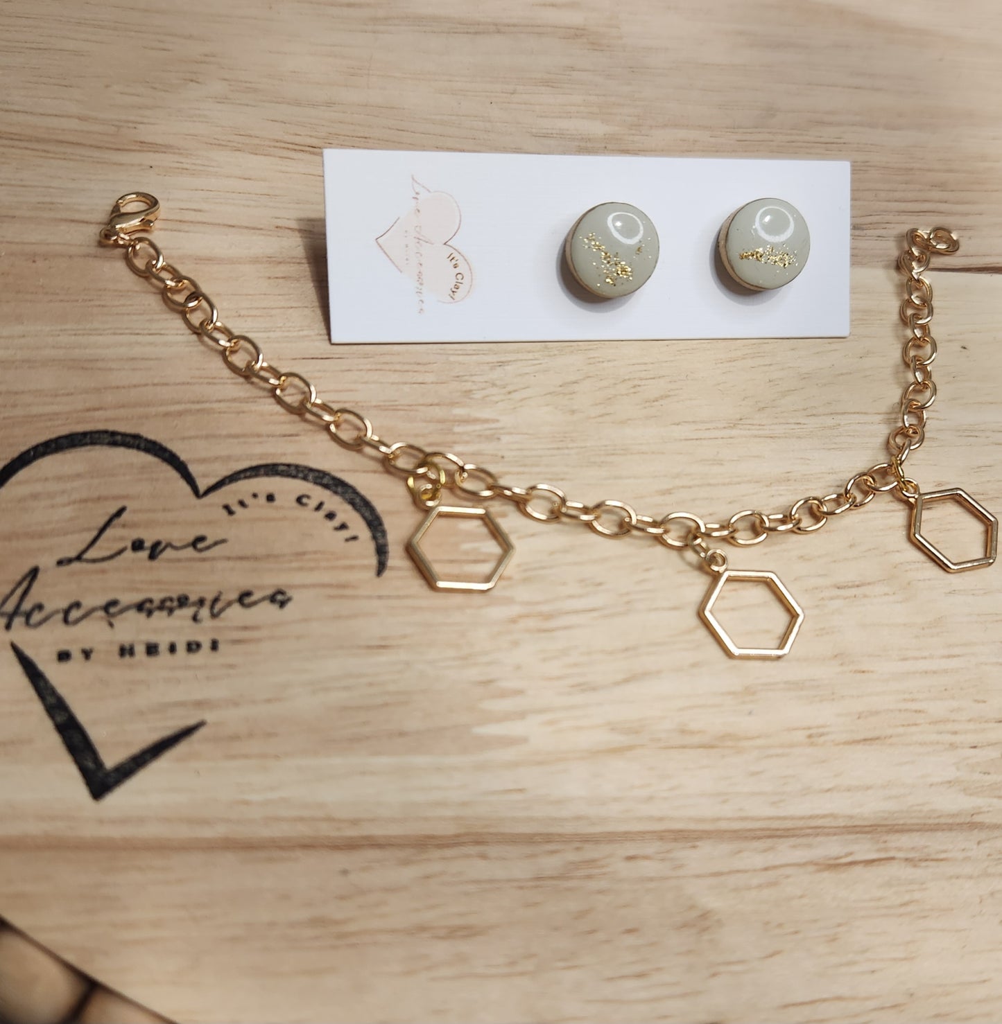 "Goldie" Jewelry set signature Hexi gold bracelet with round gold rim mint color studs.