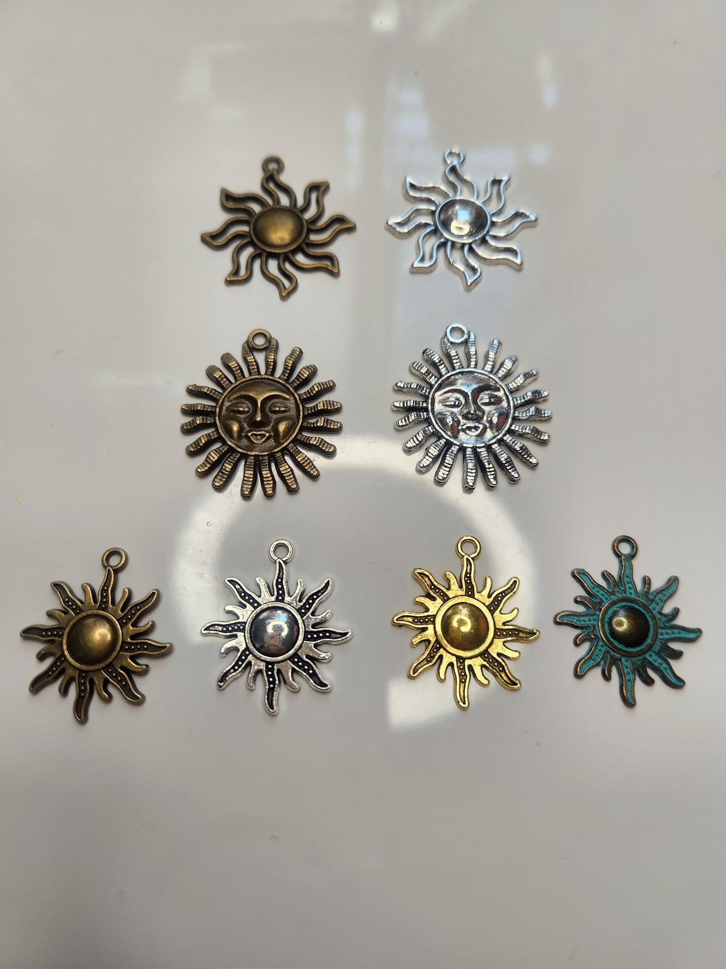 Sun metal charms