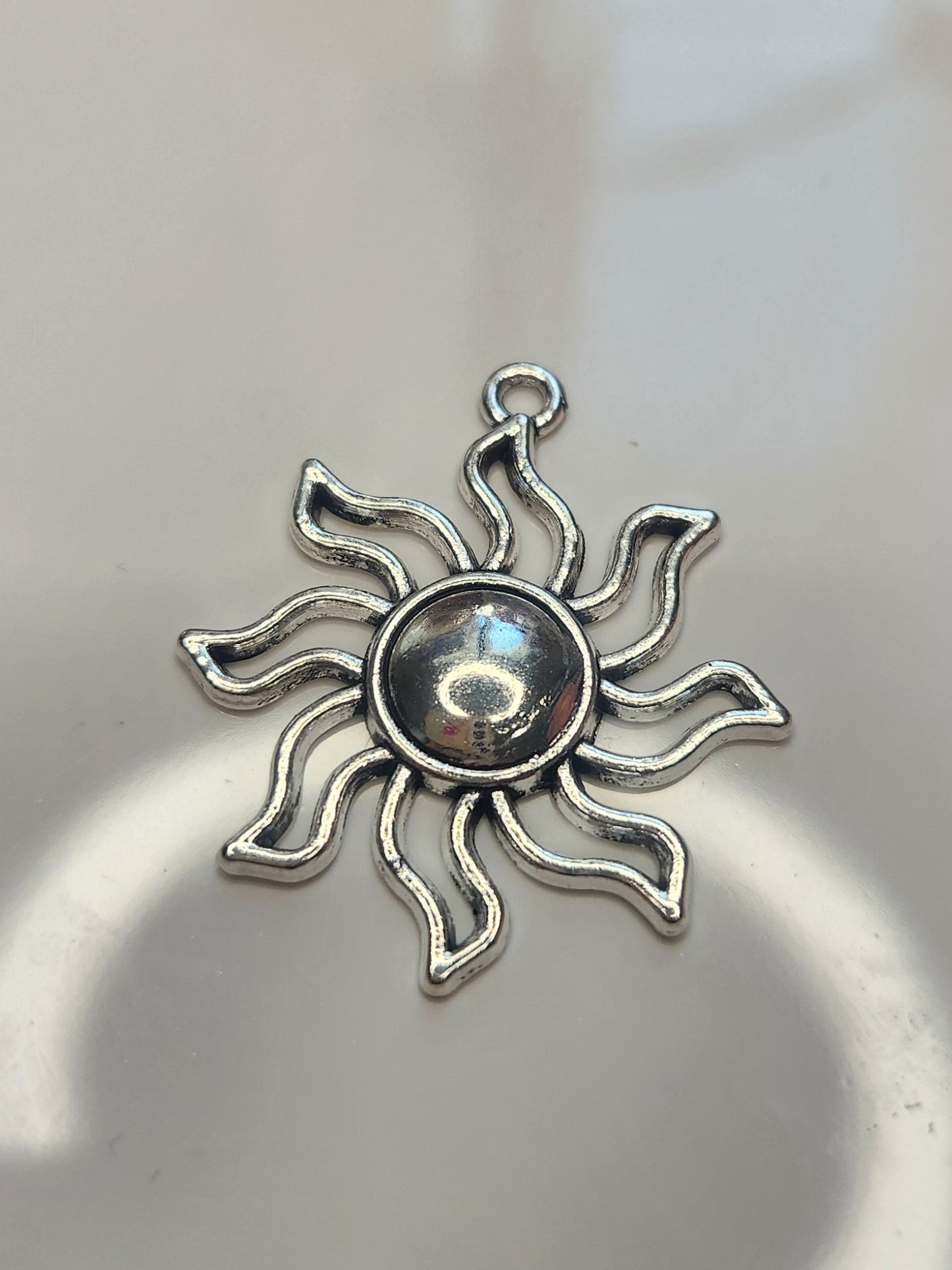 Sun metal charms