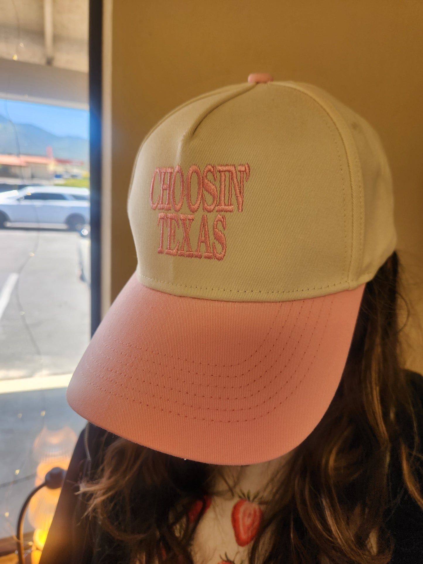 Choosin Texas pink/cream adjustable ball cap.