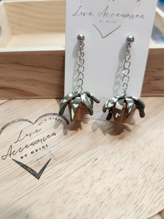 Desert Clay Collection potted plant. Silver Chain Dangles