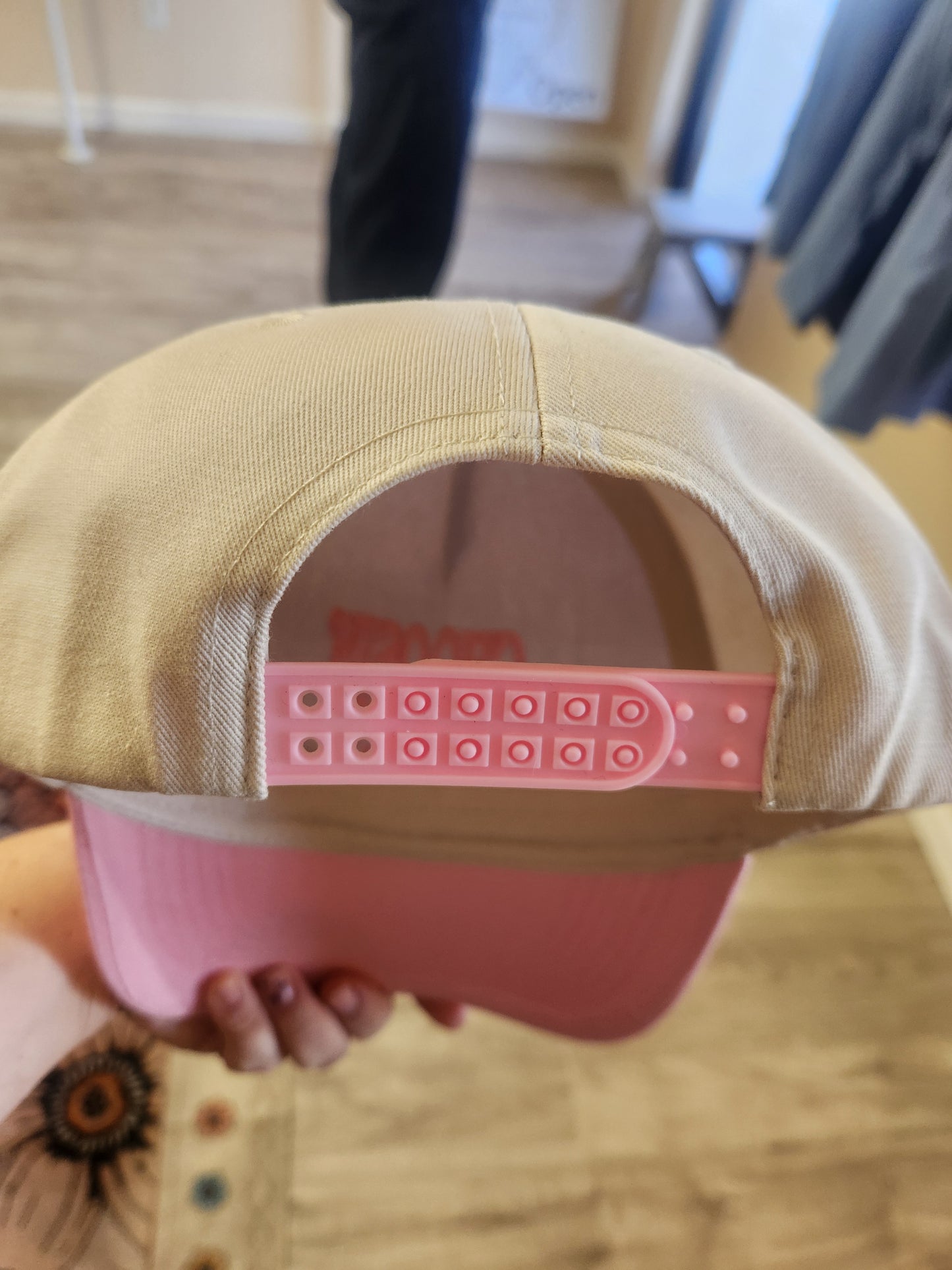 Choosin Texas pink/cream adjustable ball cap.